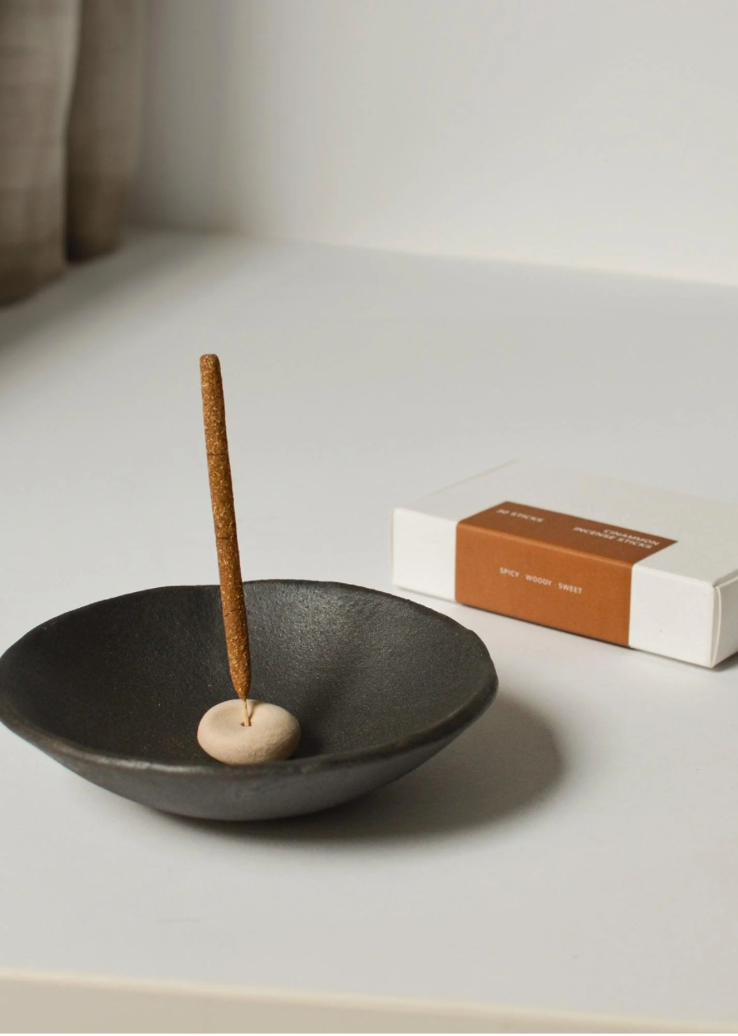 Warm and aromatic cinnamon incense ideal for spiritual practices and creating a cozy atmosphere.