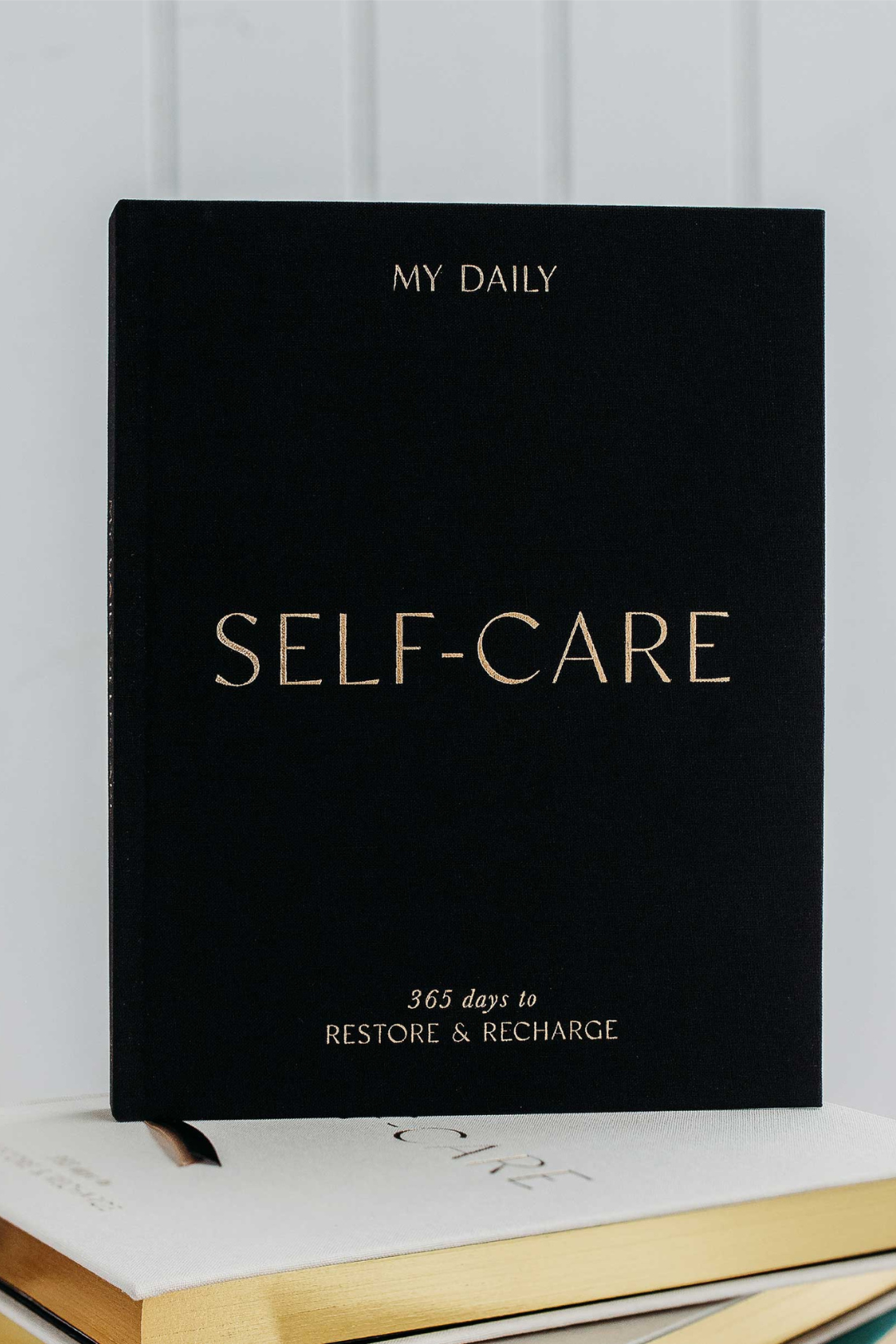 Self-care reflection journal featuring prompts for daily reflection and self-awareness, helping you nurture well-being and personal growth. This journal is sold at Blackbird Designs and made by Blush and Gold Journals.