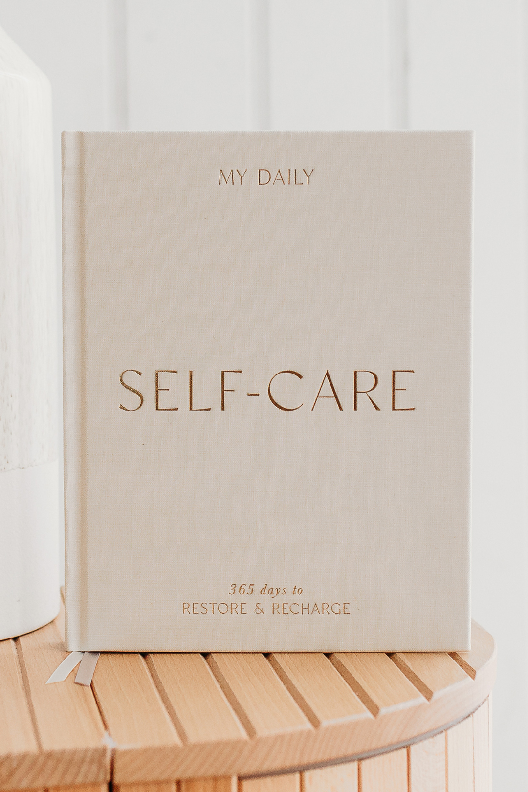 Self-care reflection journal featuring prompts for daily reflection and self-awareness, helping you nurture well-being and personal growth. This journal is sold at Blackbird Designs and made by Blush and Gold Journals.