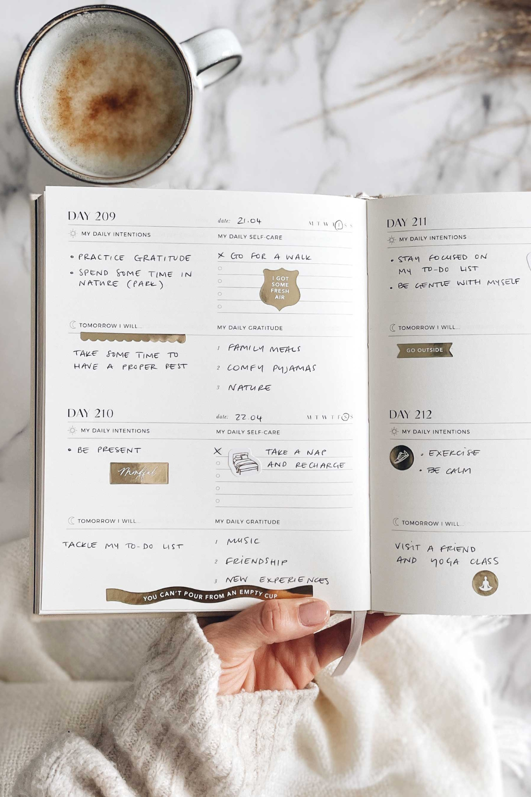 Self-care reflection journal featuring prompts for daily reflection and self-awareness, helping you nurture well-being and personal growth. This journal is sold at Blackbird Designs and made by Blush and Gold Journals.