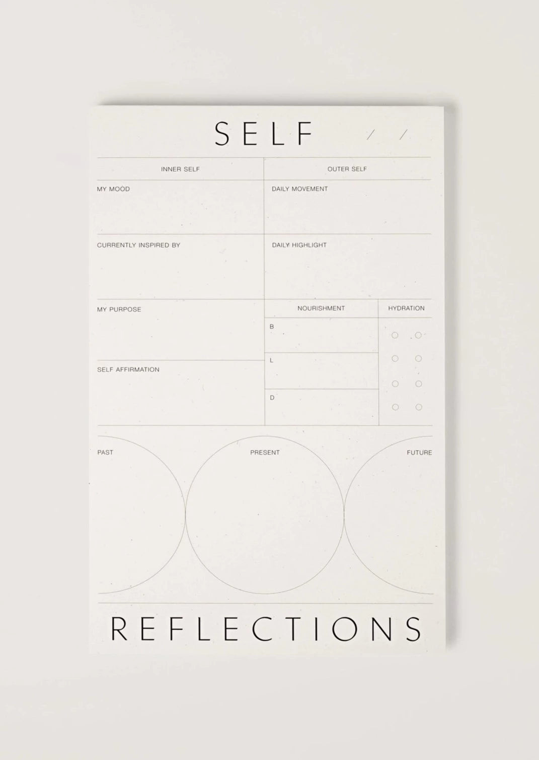 Self-Reflection Pad - A purposeful tool for introspection and personal growth. This unique pad offers structured prompts to guide your self-reflection journey. Designed for clarity and insight, it's an ideal companion for journaling enthusiasts and those seeking self-improvement. Elevate your self-discovery with this thoughtful self-reflection pad. This notepad is from Wilde House Paper and sold at Blackbird Designs.