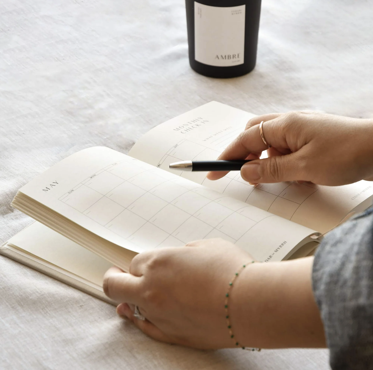 Living with Intent Journal featuring guided prompts for mindfulness, self-reflection, goal-setting, and daily habit tracking for a purposeful and intentional life.