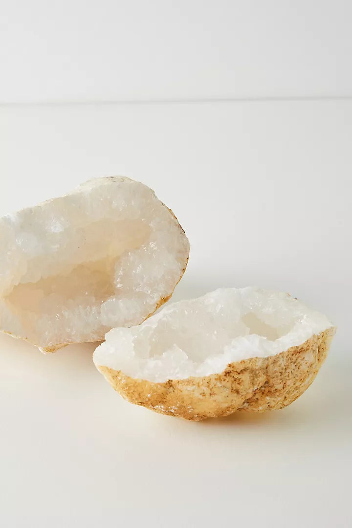 Decorative geode with natural crystalline formations for a calming atmosphere.