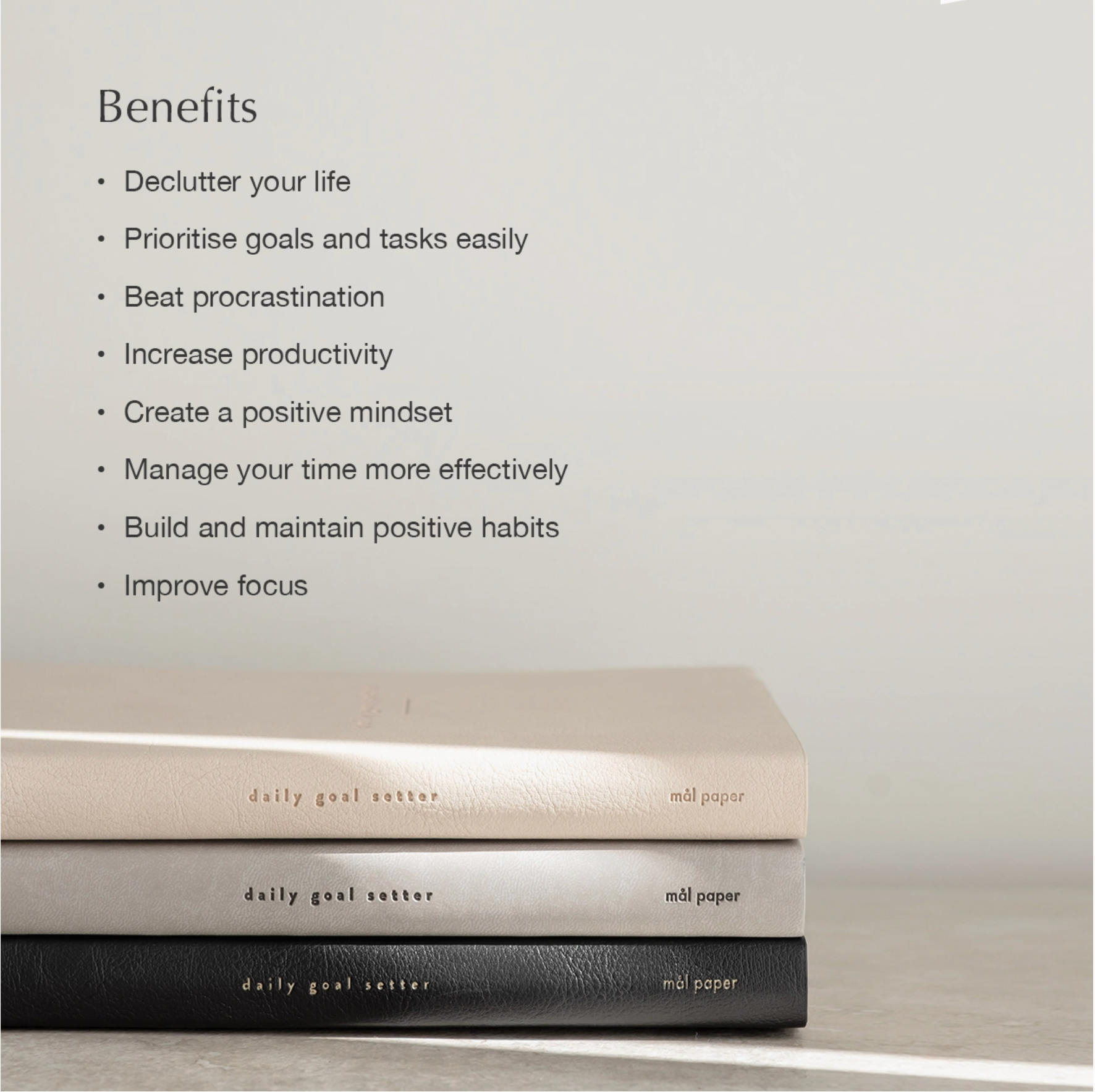 Photo of listing the benefits of using Blackbird Design's stylish daily goal planner for women, focusing on mindfulness and productivity.