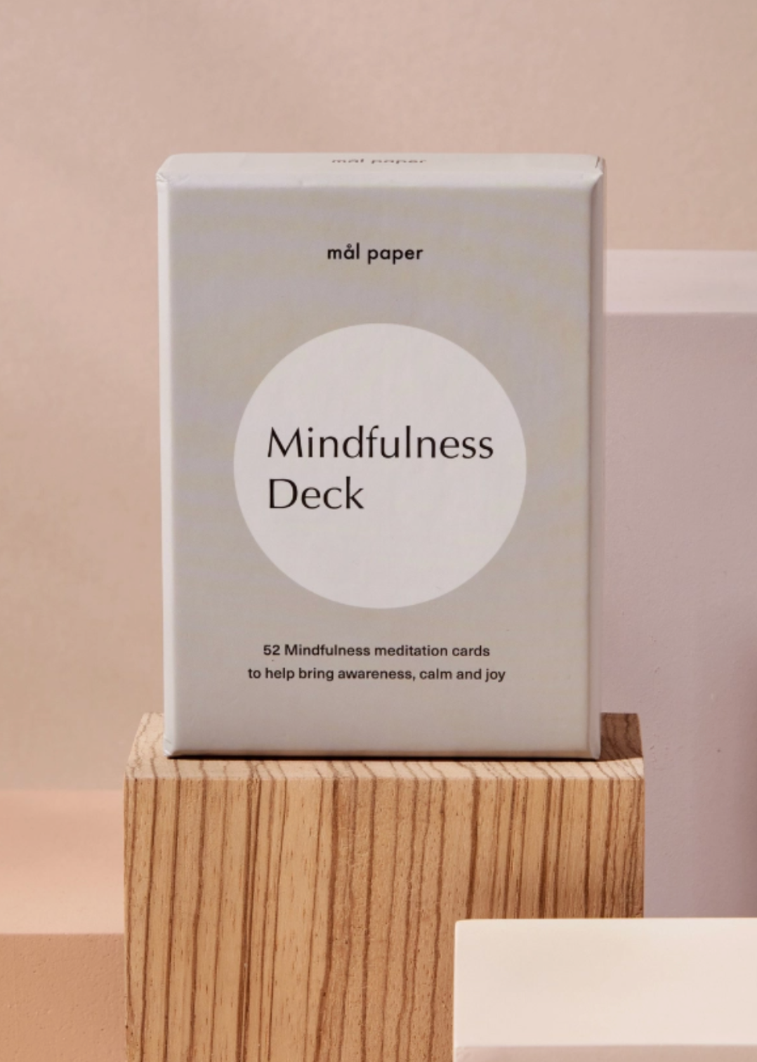 Photo of minimalist mindfulness meditation card deck for stress relief and self-reflection.