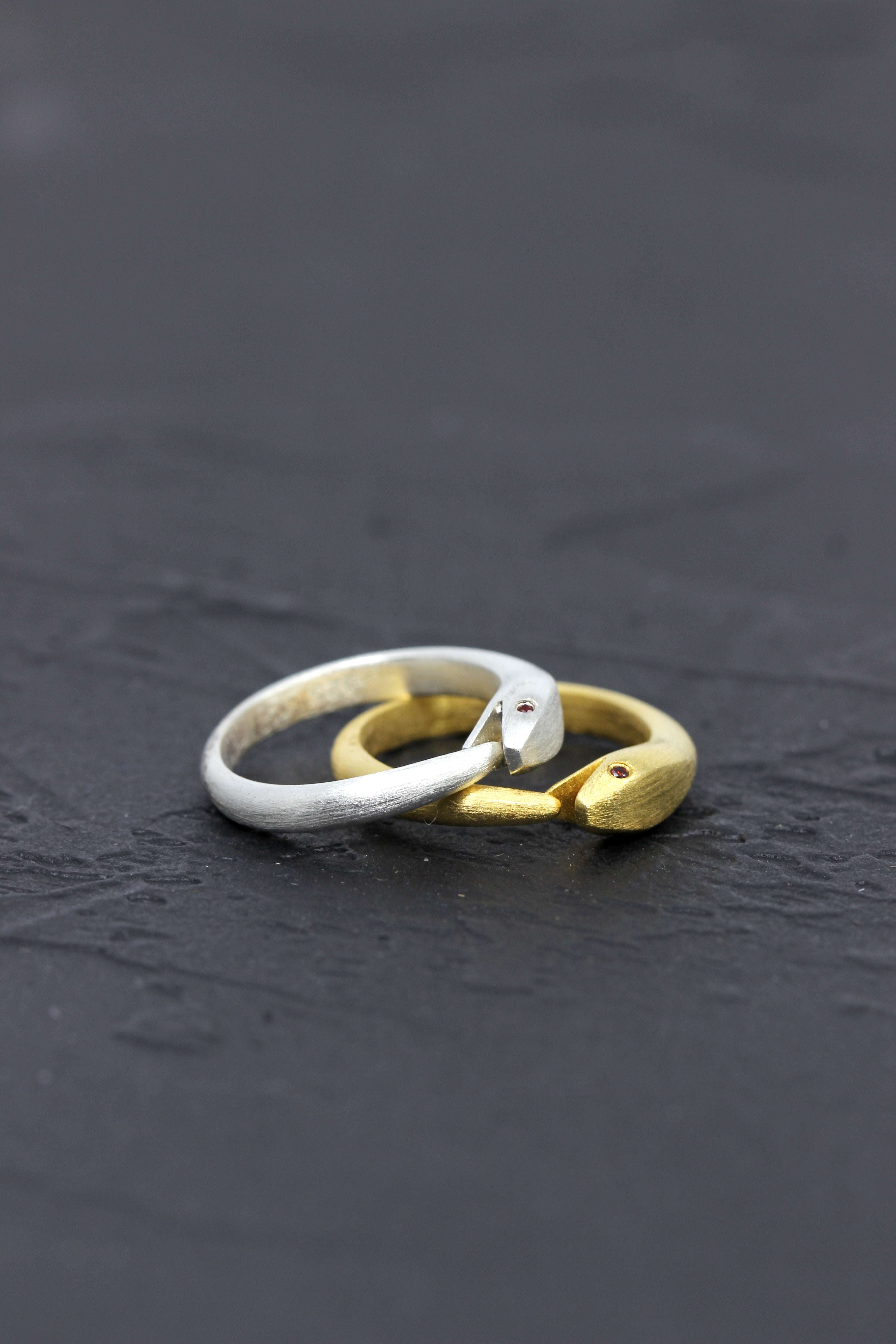 Handcrafted serpent ring with a timeless wrap-around design, available in multiple finishes.